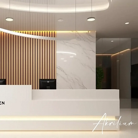 Ресепшн белого цвета с подсветкой для клиники из акрилового камня Staron